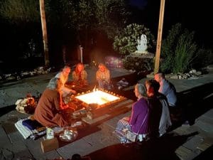 Our History & Mission Photo of homa outside at night